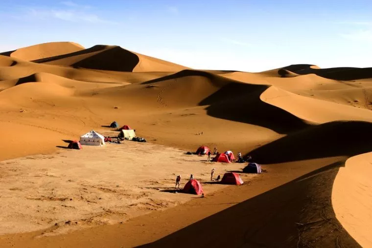 Tents of a desert camp among the dunes of Erg Chebbi, Merzouga