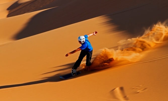 Sandboarding - Sandsurfing desert Morocco