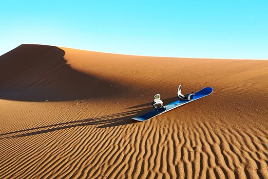 Sandboarding - Sandsurfing desert Morocco