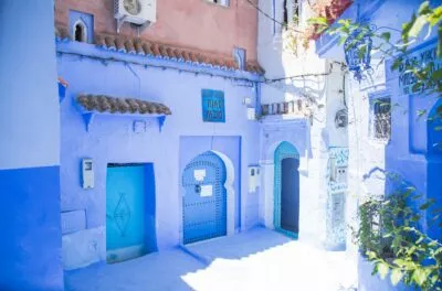 Blue doors and whitewashed walls in a Chefchaouen lane