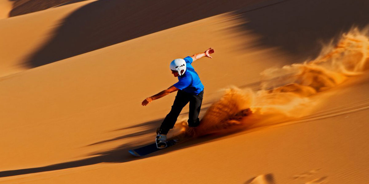 Sandboarding in Desert Morocco