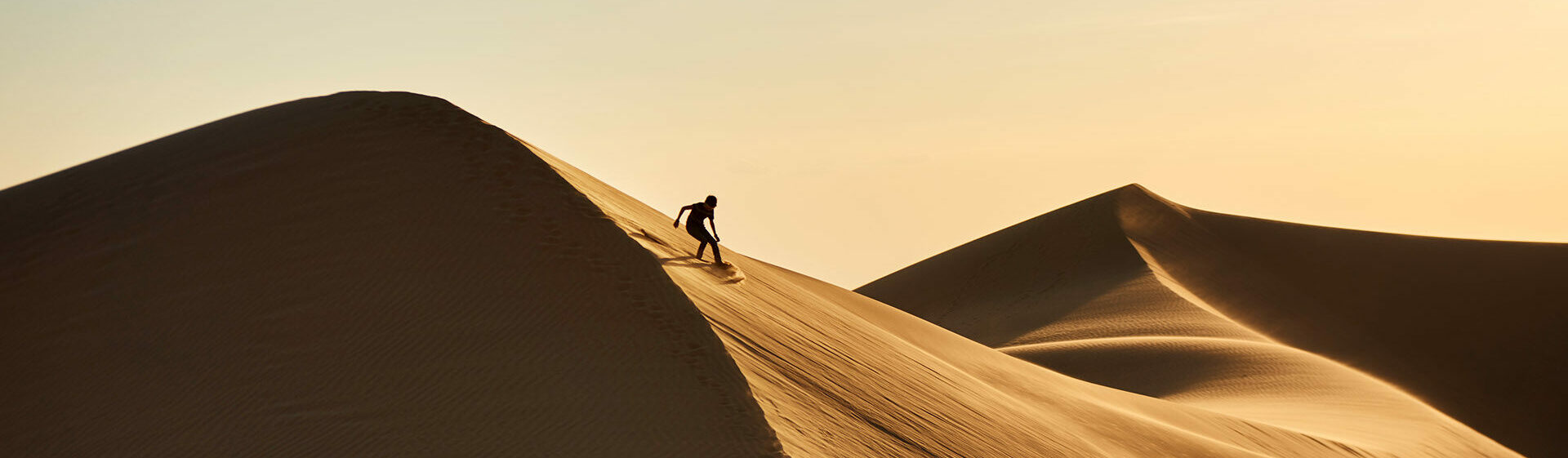 Sandboarding in Desert Morocco
