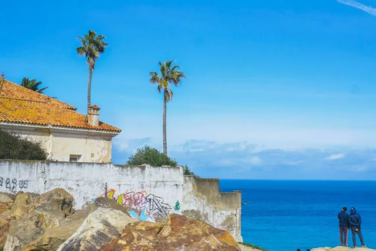 Coastal walls and palm trees on the Tangier seafront, Morocco